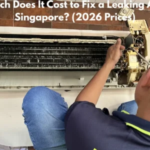 Aircon technician toolkit with price notepad showing Singapore repair costs in SGD 2026