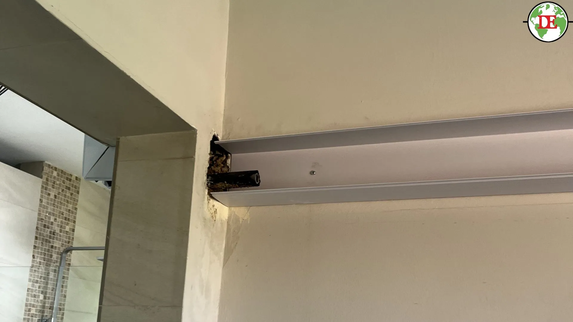 Comparison of exposed PVC aircon trunking versus concealed trunking behind false ceiling